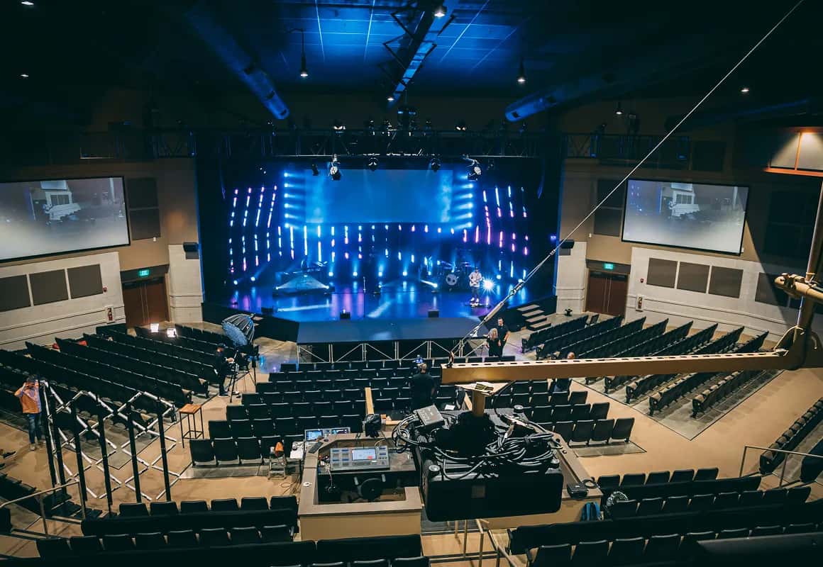 Venue setup and crew coordination for a live production